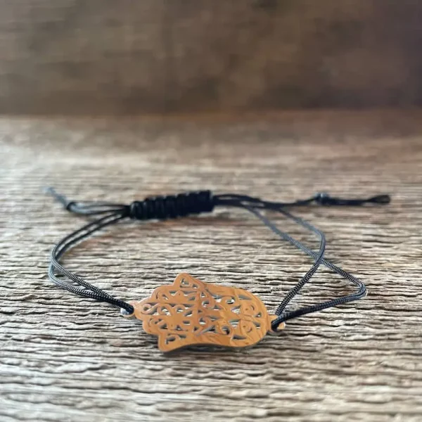 HAMSA šnúrkový náramok. čierna šnúrka a medzikus hamsa